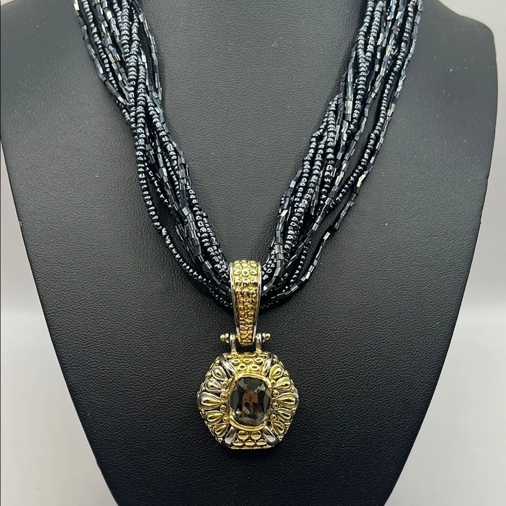 Elegant Black Beaded Necklace with Gold and Silver tone Pendant with Quartz